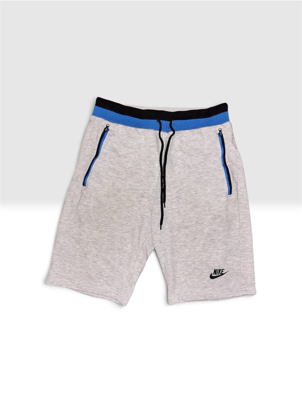 Nike Men's Light Gray Performance Shorts with Blue Trim